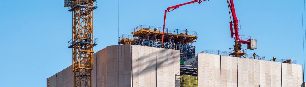 Loft conversion workspace with secure scaffold platform for safe renovation access